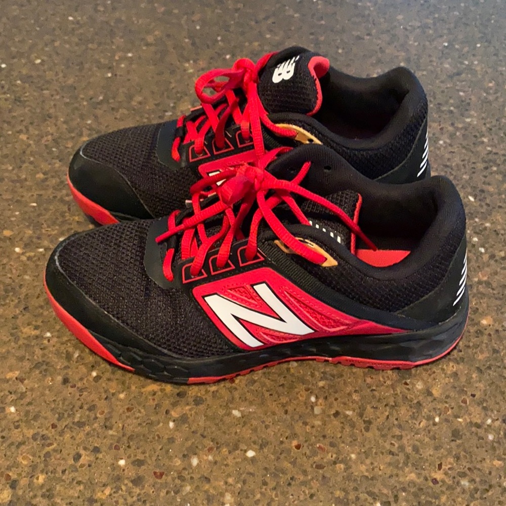 Boys size 5.5 New Balance turf shoes